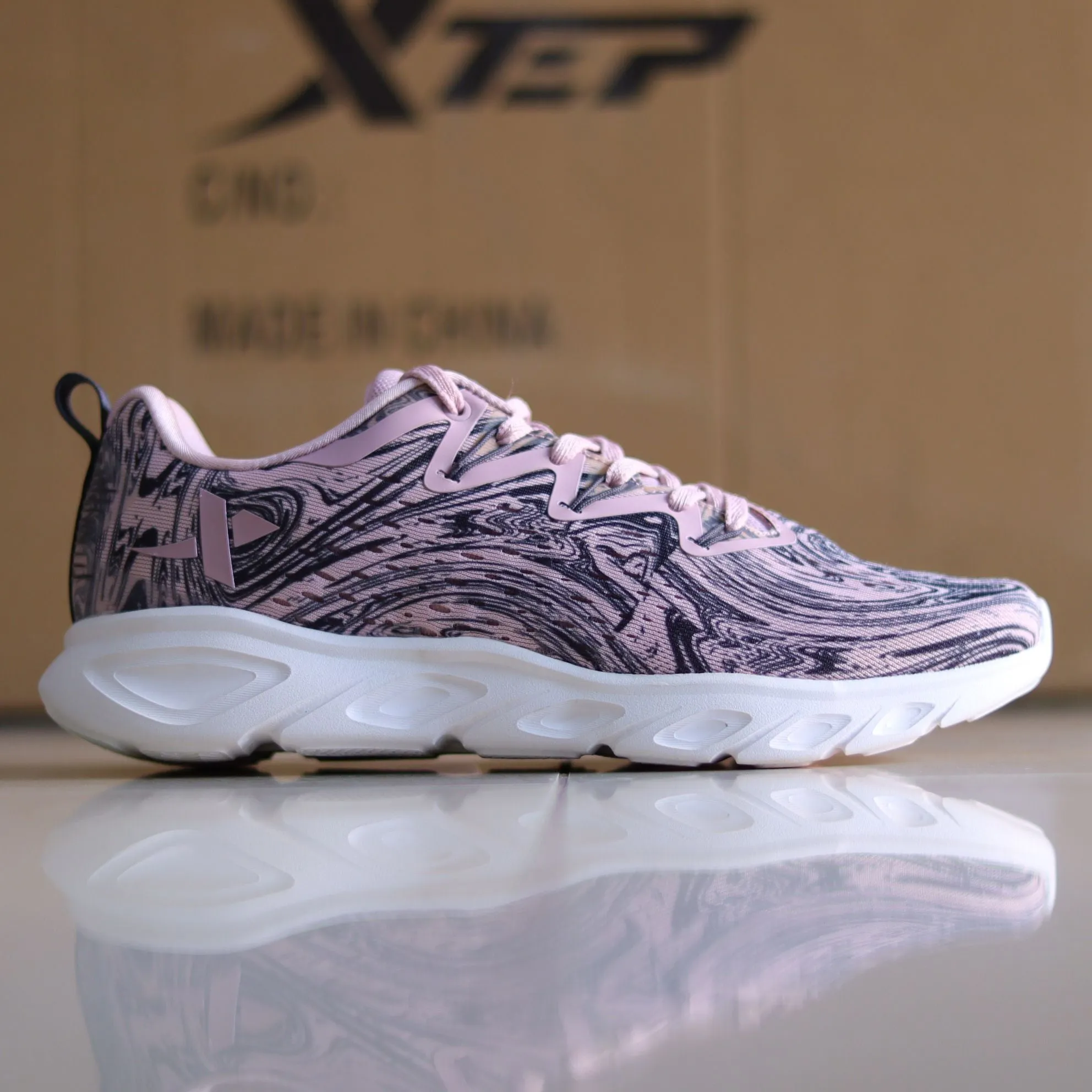 X31 - Women's Medicated Running Shoe by Xtep